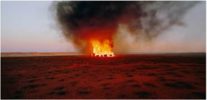 Rosemary Laing Burning Ayer #6, 2003 Type C photo 110 x 224 cm, no 2 from ed of 10 Images courtesy Annette Larkin Fine Art and Tolarno Galleries