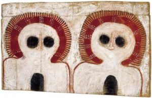 Charlie Numbulmoore c.1907-1971 Ngarinyin people Untitled (Wanjinas) c.1965 natural earth pigments on cardboard 42 by 66 cm. Image courtesy Tim Klingender Fine Art