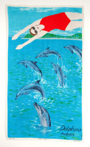 Adrienne Doig Diving with dolphins 2010 applique & embroidery on linen 79x45.5cm. Image courtesy the artist and Martin Browne Contemporary